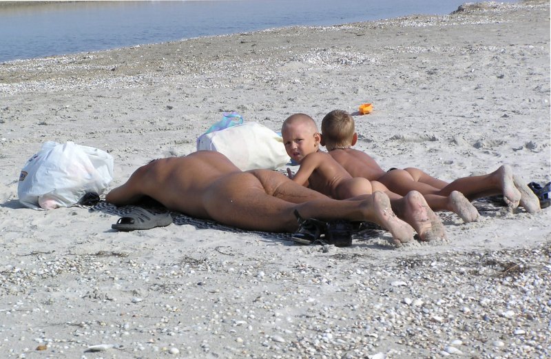 Pic: Naked boy on the beach