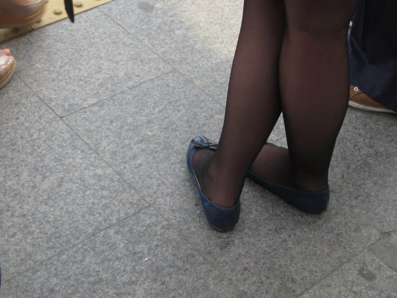 Legs in ballet shoes and tights