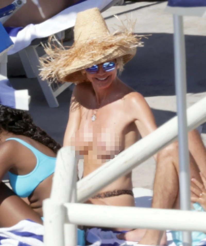 Celebrities sunbathe topless