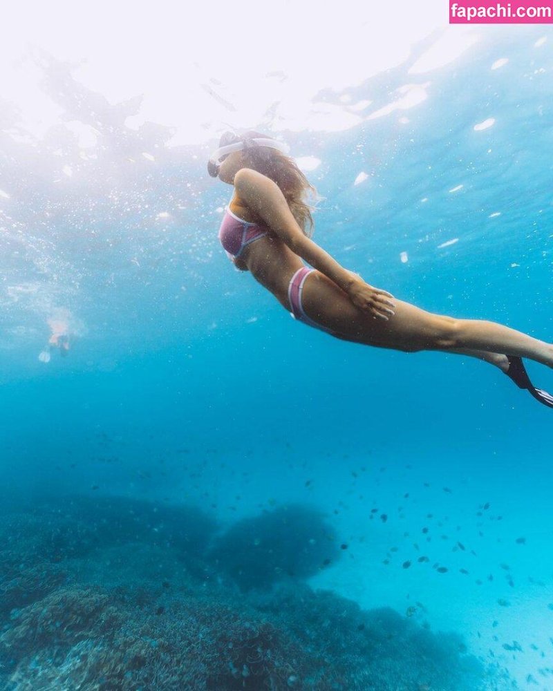 Girl swims under water