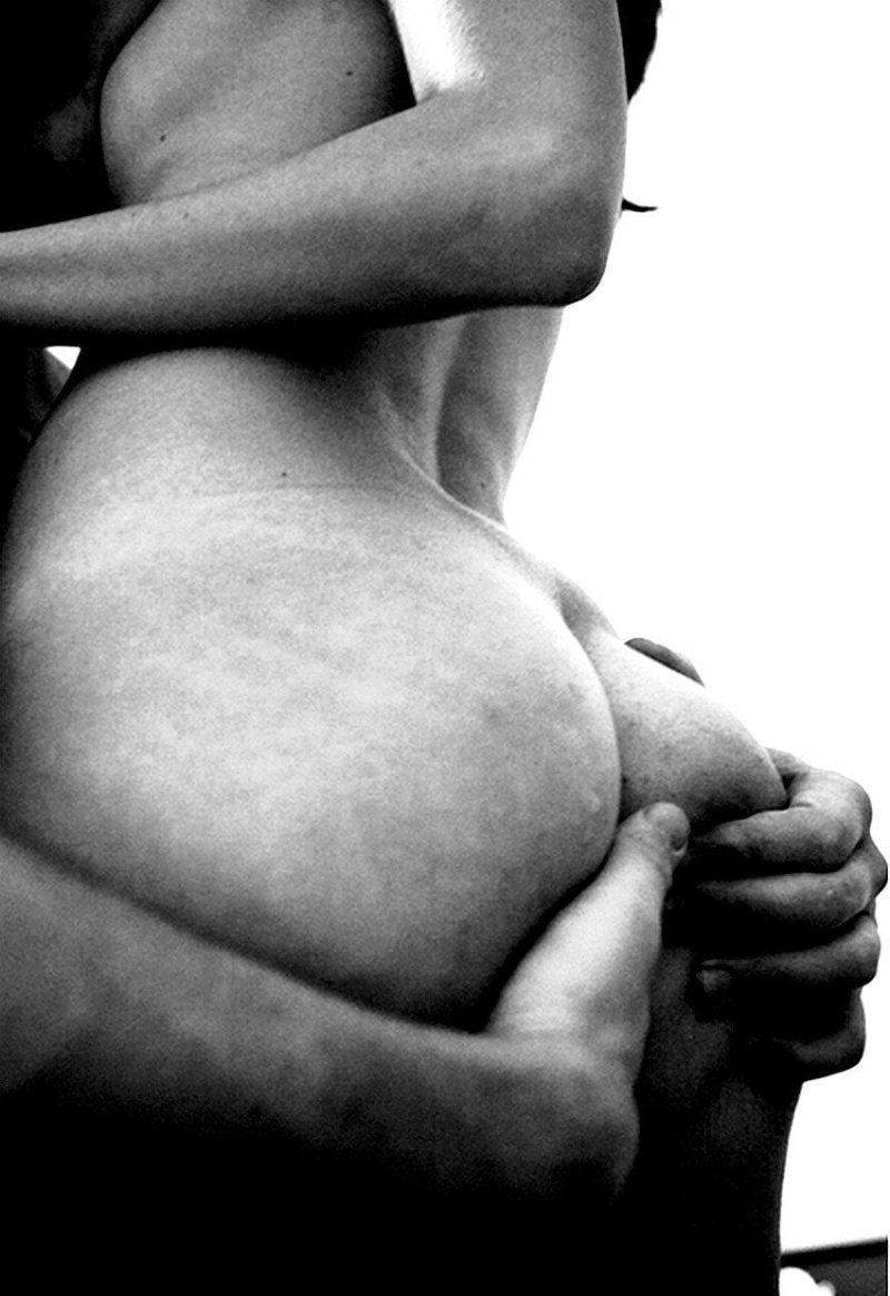 The guy hugs a naked woman