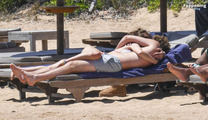 Heidi Klum and Tom Kaulitz on the beach