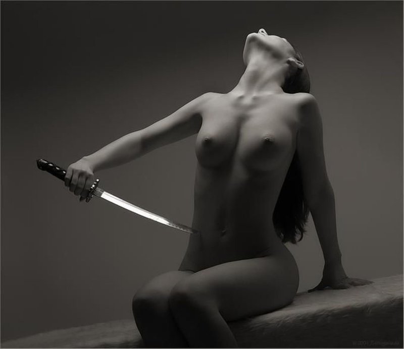 Naked girl with a sword