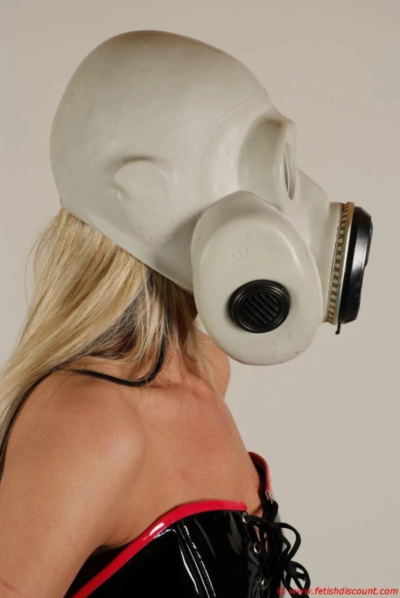 Naked woman in a gas mask