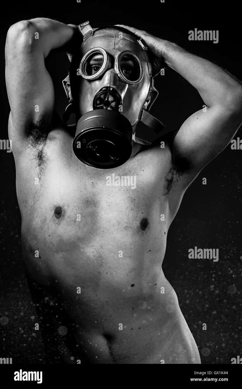 Naked man in a gas mask
