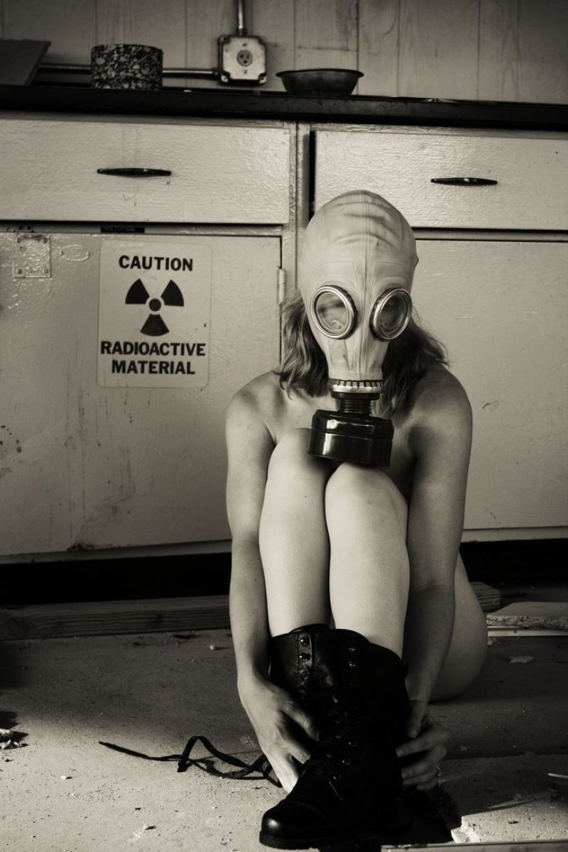 A woman in a gas mask