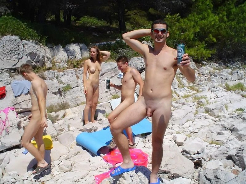 Men on a nudist beach
