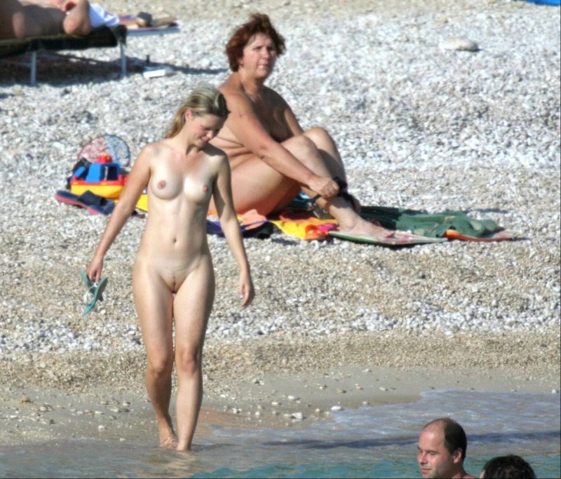 Naked with parents on the beach