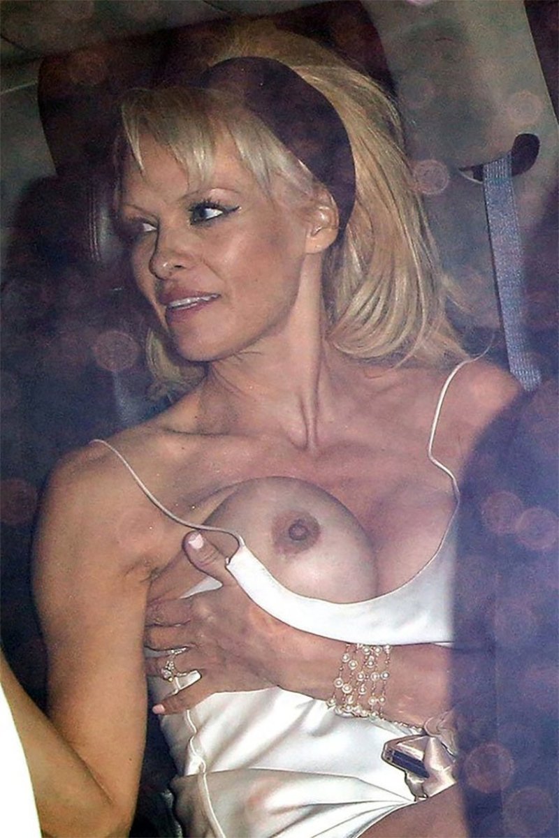 Pamela Anderson lit her breasts