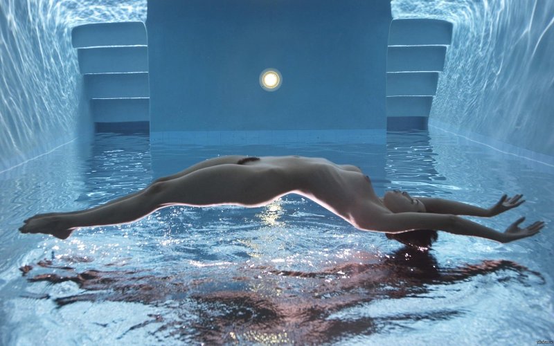 Naked girl in water