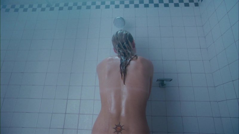 Girl with a dragon tattoo naked
