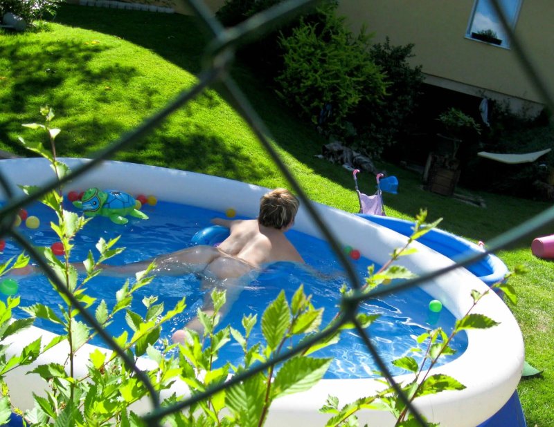 Girl in the pool in the country